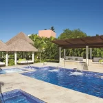 4 outdoor pools, open 8 AM to 6 PM, cabanas (surcharge), pool umbrellas