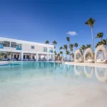 3 outdoor pools, open 9:00 AM to 6:00 PM, free cabanas, pool umbrellas