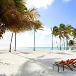 Private beach, white sand, free beach shuttle, beach umbrellas