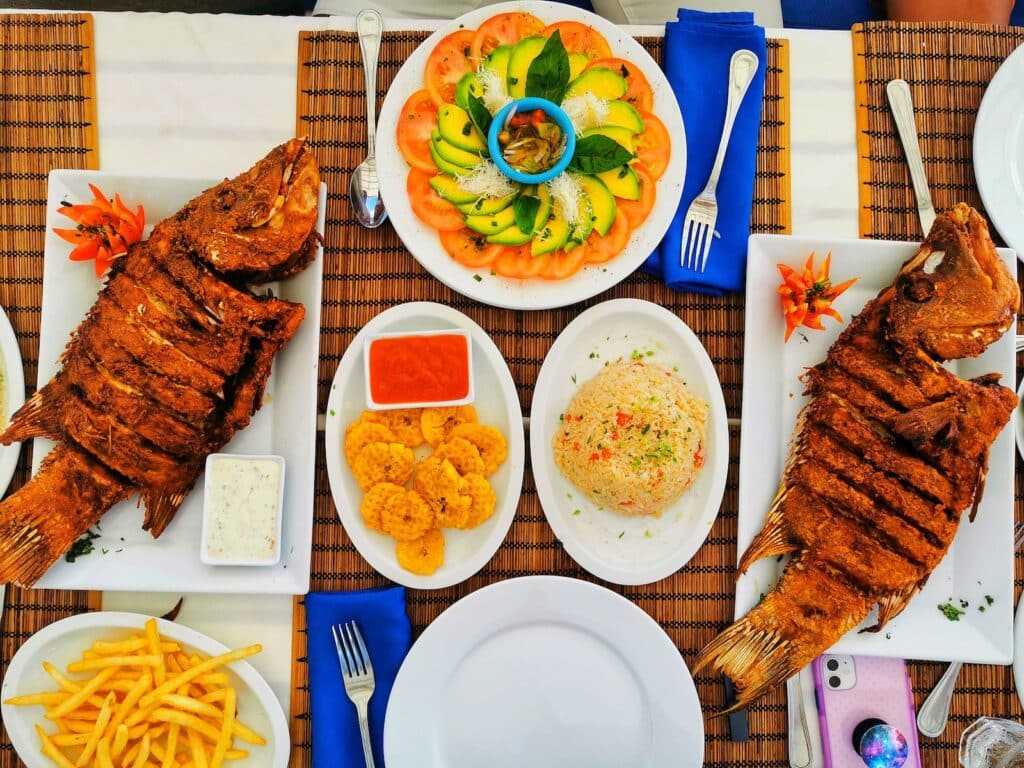 grilled fishes and fried rice, dominican foods